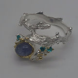 Sterling Silver Tanzanite and green cz white and gold ring