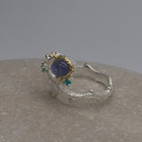 Sterling Silver Tanzanite and green cz white and gold ring