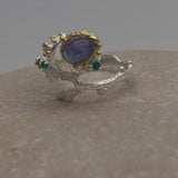 Sterling Silver Tanzanite and green cz white and gold ring