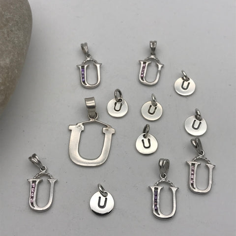 Initial charm letter U
