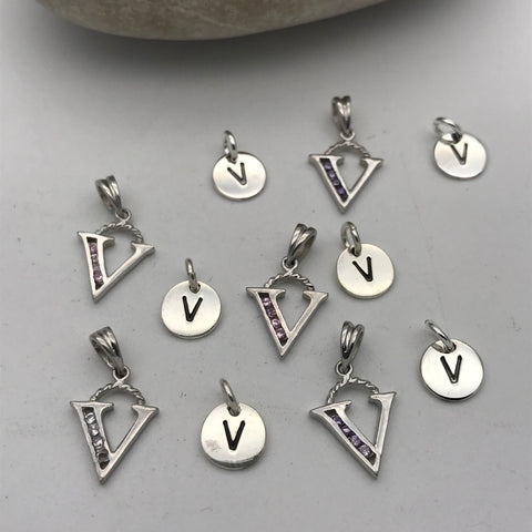 Initial charm letter V