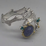 Sterling Silver Tanzanite and green cz white and gold ring