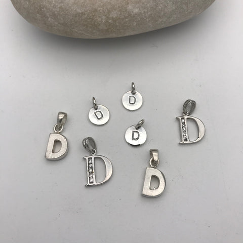 Initial charm letter D