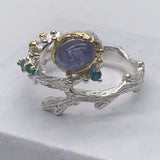 Sterling Silver Tanzanite and green cz white and gold ring