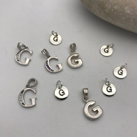 Initial charm letter G
