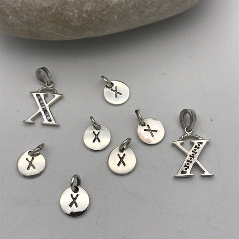 Initial charm letter X
