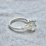Diamond 10mm Oval Solitaire Ring With Baguettes