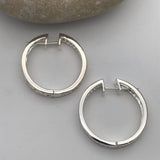 Stunning Baguette Diamond Hoop Half Scroll Earrings