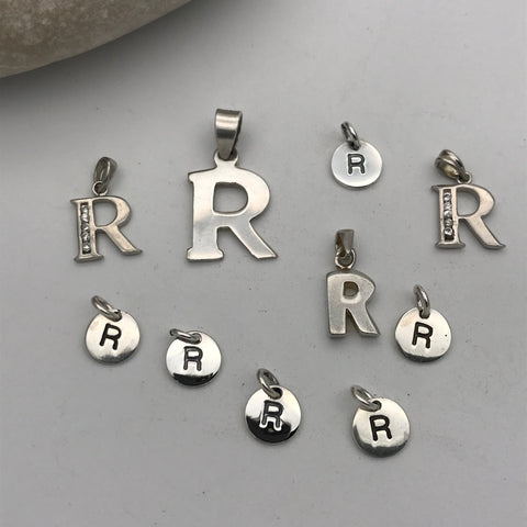 Initial silver charm letter R