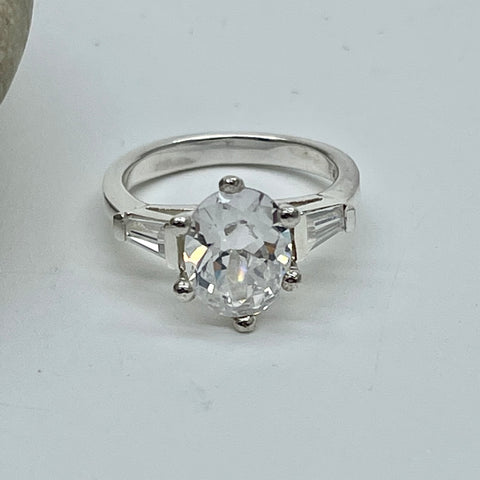 Diamond 10mm Oval Solitaire Ring With Baguettes