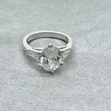 Diamond 10mm Oval Solitaire Ring With Baguettes
