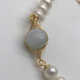 Freshwater Pearl bracelet with gold and green stones