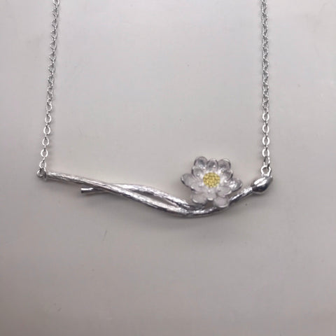 Silver lotus on a double branch with gold necklace