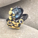 Blue Topaz and tanzanite black rhodium gold ring